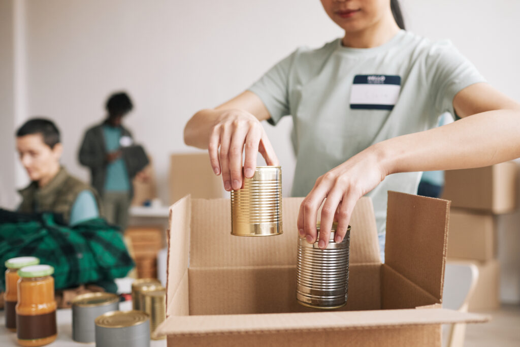 Volunteer Packing Donated Food